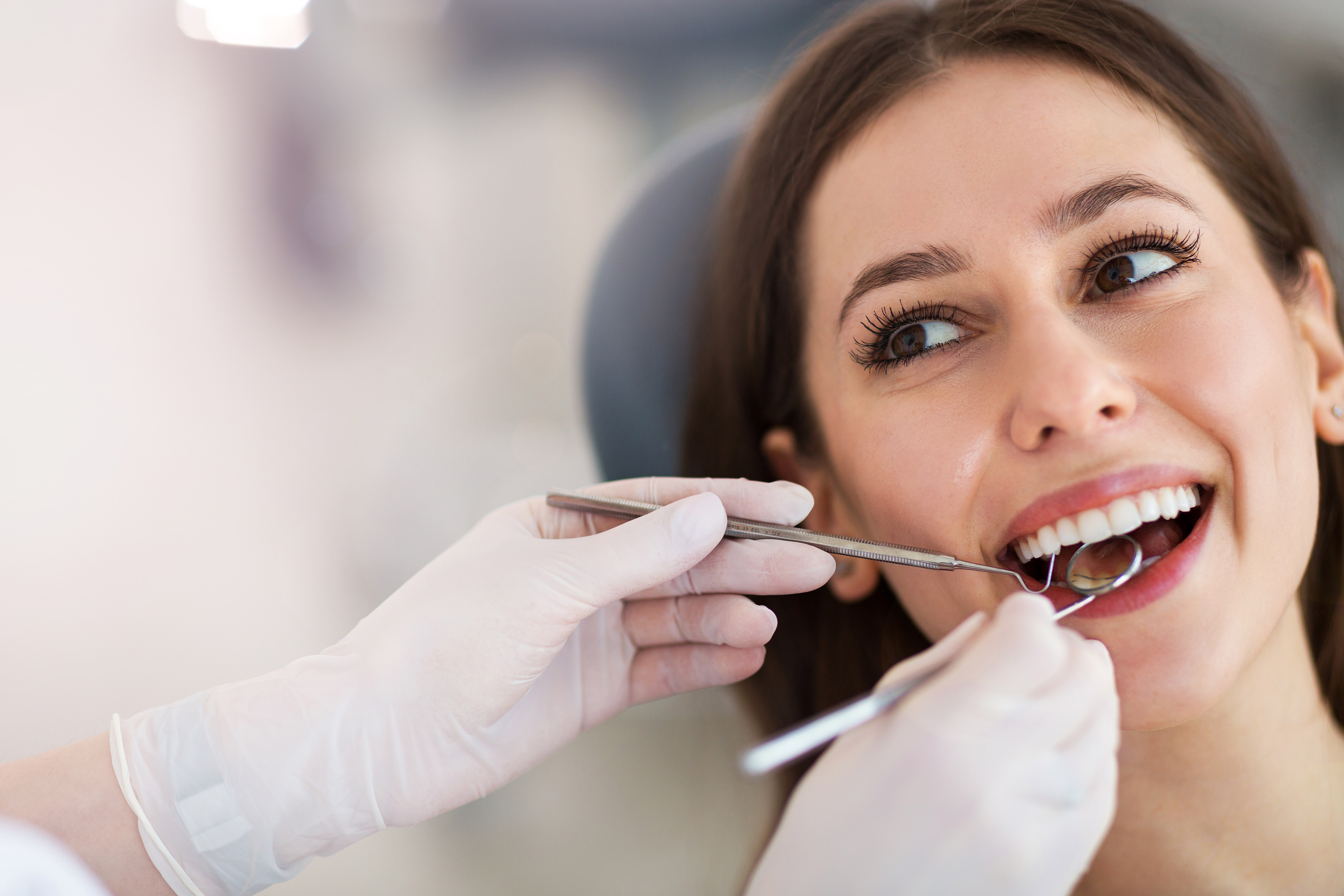 Woman in dental chair at dentist.jpg